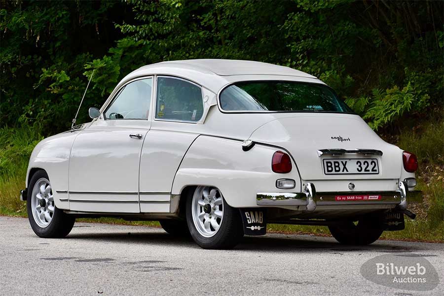 Immaculately restored from bumper to bumper, this 1964 Saab 96 Sport showcases its rally-bred DNA from every angle—including factory-correct badging, period chrome, and signature twin stripes along the rockers.