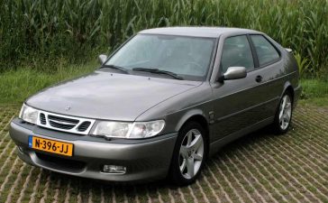 Captivating Classic: The Saab 9-3 Aero Coupe in all its Vintage Splendor, a Fusion of Elegance and Power on Four Wheels.