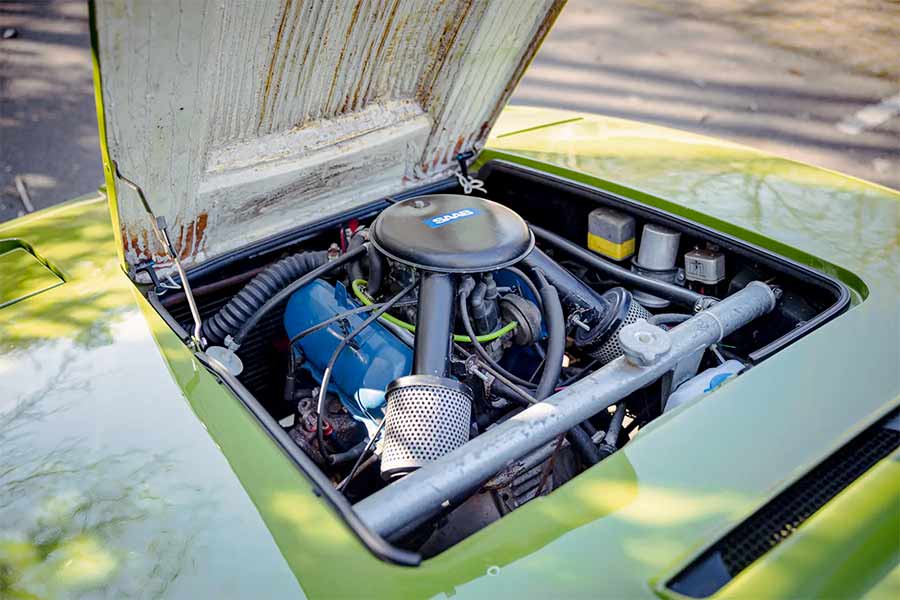  Take a closer look at the well-maintained engine bay of the 1970 SAAB Sonett III, showcasing its robust engine and impressive mechanical craftsmanship