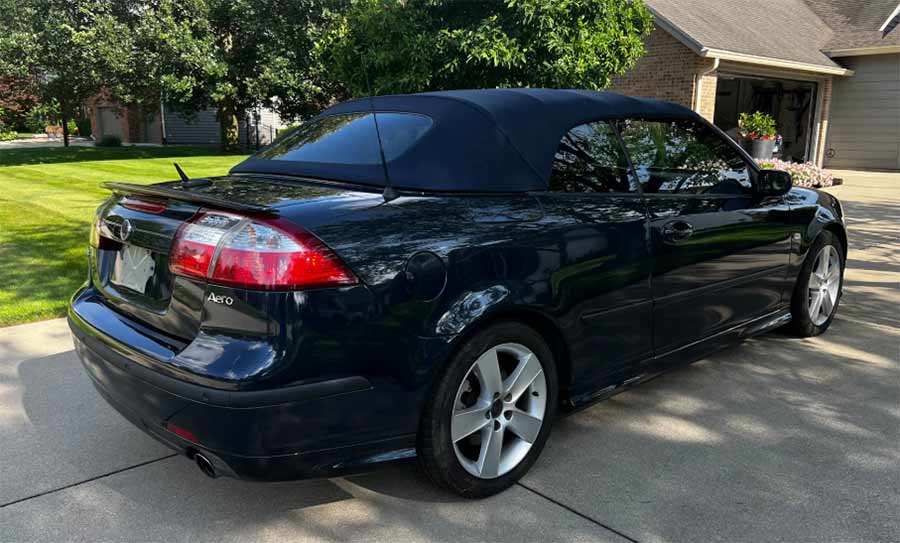 the one-owner 2007 Saab 9-3 Aero Convertible in Nocturne Blue — garage-kept, with its power soft-top neatly folded in place