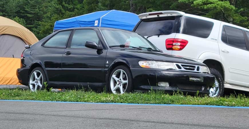 Saab 9-3 Viggen in original black before restoration, parked at an event