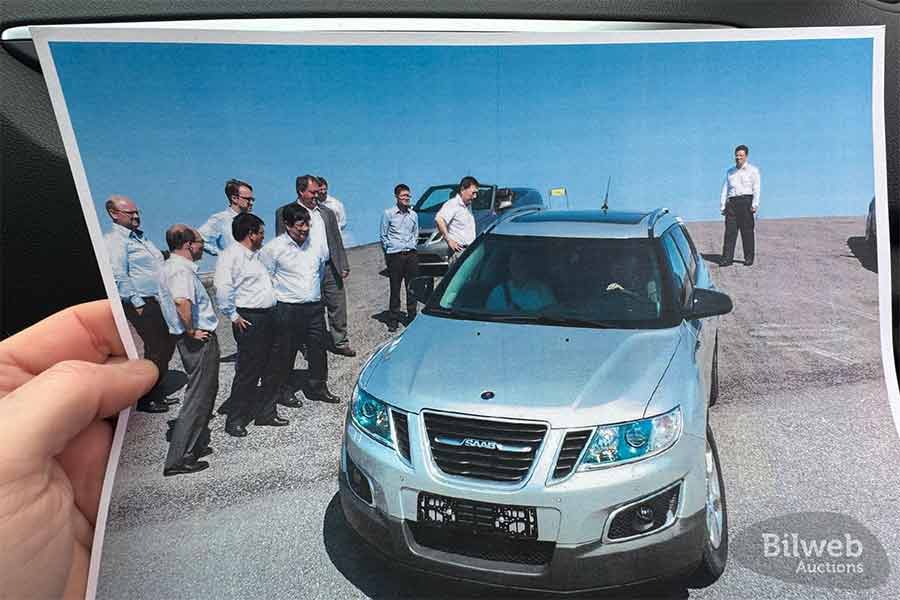Factory-New Saab 9-4X No. 001 Resurfaces After 14 Years in Hibernation! 4 Historic photo of Saab 9-4X chassis number 001 during pre-launch presentation with Saab and GM engineers in 2010.