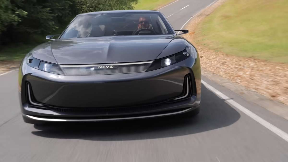 The NEVS Emily GT, according to Top Gear's Tom Ford, feels like a normal electric super saloon with fast acceleration, precise steering, and impressive handling capabilities, making it a truly remarkable driving experience.