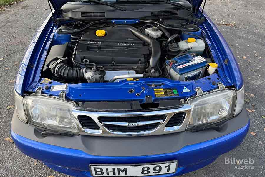 Clean engine bay of a 1999 Saab 9-3 Viggen 2.3T showing the original B235R turbo engine