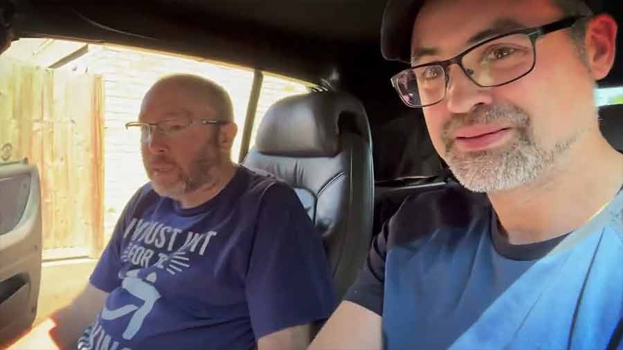 Peter Bruce interviewing David in his classic Saab 900 Convertible