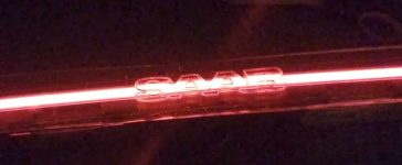 Prototype Saab 9-3 SportCombi LED bar glowing in signature red with illuminated SAAB lettering — a modern continuation of Saab’s design legacy by KM-Tronics.
