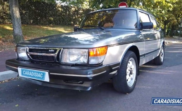 A Swedish Passion: The Journey of a Classic Saab 900 Turbo 10 Under the spotlight: A gleaming 1984 Saab 900 Turbo, meticulously restored to its original splendor, symbolizes the timeless allure of Swedish engineering and passion for automotive heritage.