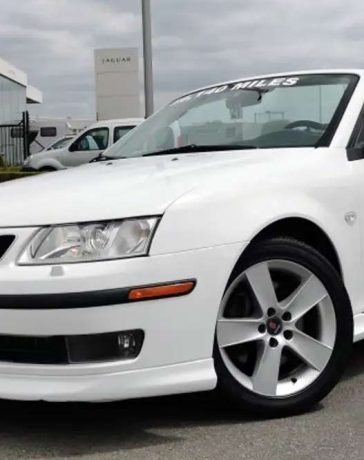 Immerse Yourself in Luxury: Explore the Pristine White Saab 9-3 V6 Aero Convertible with Low Mileage