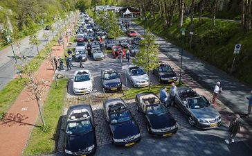 Enthusiasts and their cherished Saab convertibles line up for a picturesque gathering during the 2024 Saab Convertible Weekend at Nationalpark Harz, showcasing a vibrant display of community and automotive passion (photo by David Joost Kamermans)