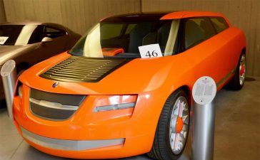 Saab Novanta: When Bertone Turned A Saab 9-5 Into A Rolling Drive-By-Wire Experiment 3 Bright orange Saab Novanta drive-by-wire concept on display at Volandia in the ASI Bertone Collection