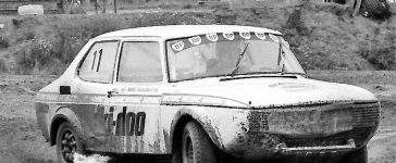 Ture Karlsson sliding his Saab 99 rallycross car through a muddy corner in Sweden