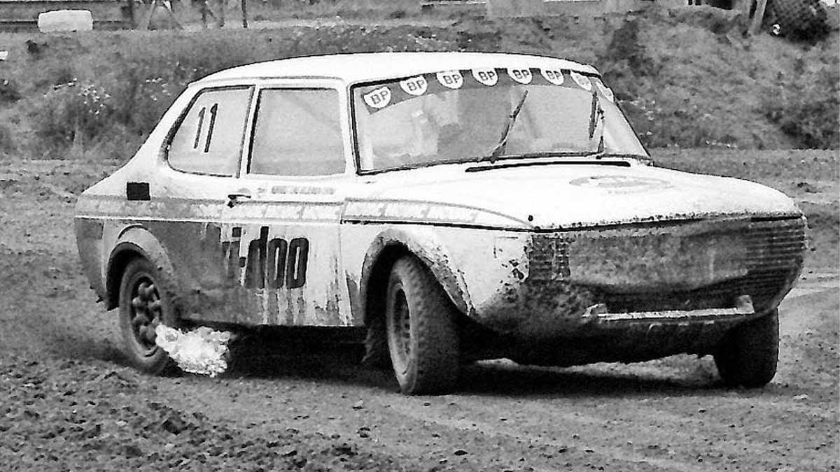 Ture Karlsson sliding his Saab 99 rallycross car through a muddy corner in Sweden
