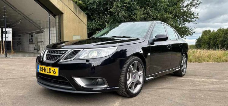 Restored 2009 Saab 9-3 Turbo X (81-HLD-6) parked in front of Lammertse Techniek after full OEM+ restoration