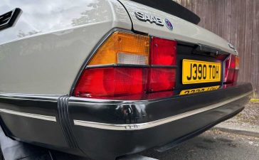 Close-up view of the rear of a 1991 Saab 900 S Turbo, highlighting the distinctive tail lights and classic design.