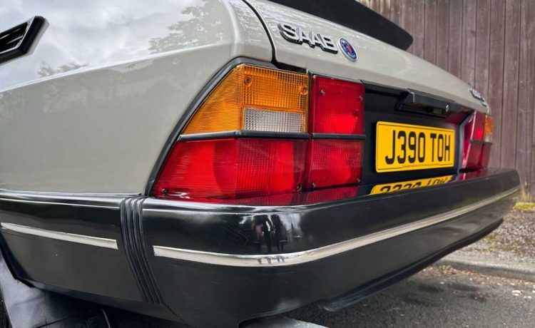 The Timeless Appeal of the Classic Saab 900 S Turbo: A Detailed Review and Buyer's Guide 9 Close-up view of the rear of a 1991 Saab 900 S Turbo, highlighting the distinctive tail lights and classic design.