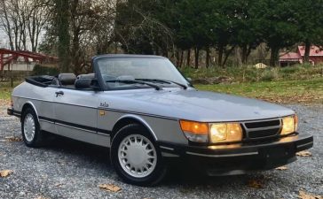 1986 Saab 900 Turbo Convertible 5-Speed in Silver Metallic, Parked Outdoors, Exemplifying Classic Elegance and Timeless Design