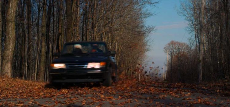 Still from Sabotage: The Saab 900 Turbo in its final role—elegant, fragile, and unforgettable.