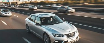 Henrik Bergman’s AI recreation of Jason Castriota’s lost Saab 9-3 Phoenix concept driving on an open highway