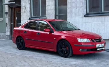 Red 2003 Saab 9-3 Vector parked in Stockholm, restored after a lifetime on Sweden’s salt-free Gotland island.