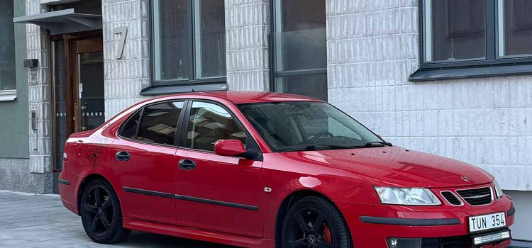 Red 2003 Saab 9-3 Vector parked in Stockholm, restored after a lifetime on Sweden’s salt-free Gotland island.