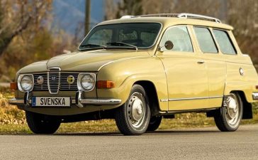 This 1971 Saab 95 Wagon on Bring a Trailer Was Built to Work, Not to Impress 11 Front three-quarter view of a beige 1971 Saab 95 Wagon with V4 engine, steel wheels, roof rack, and period Swedish plates