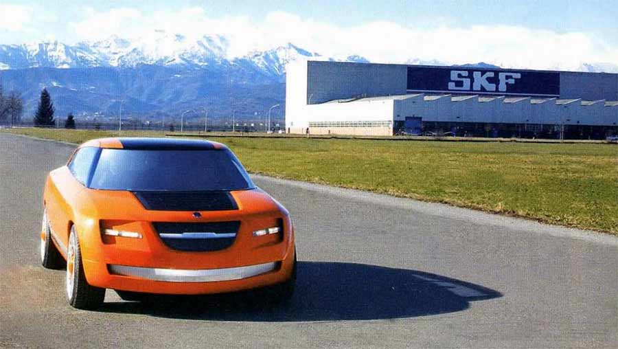 Saab Novanta: When Bertone Turned A Saab 9-5 Into A Rolling Drive-By-Wire Experiment 12 Saab Novanta concept driving near the SKF testing facility with mountain backdrop