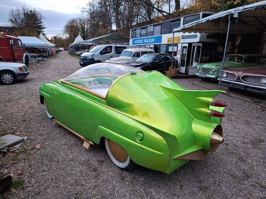 Rear view of the Saab 96 “Cosmonaut” with space-themed tail fins and bubble canopy