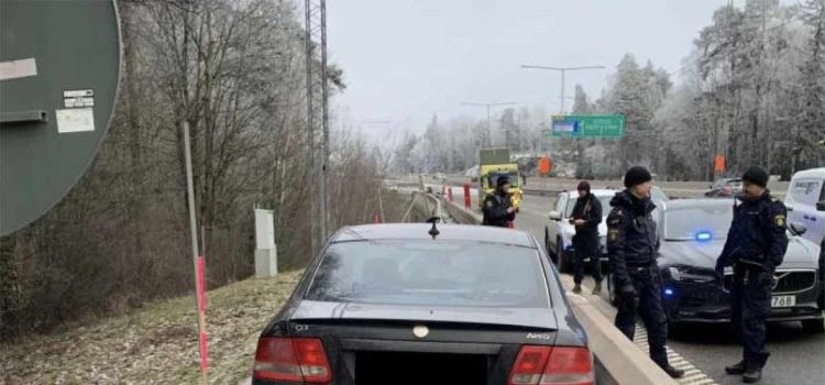 Saab Stuck Between Highway Guardrails